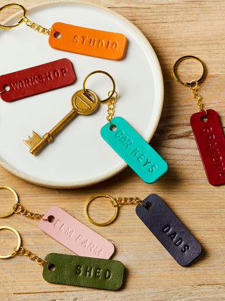 handstamped leather keyrings with personalised message.