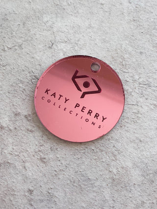 Pink acrylic circle discs for Katy Perry.