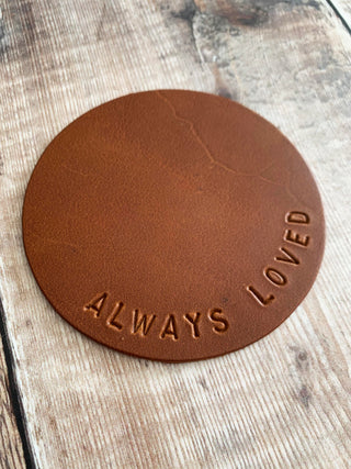Tan leather coaster, always loved