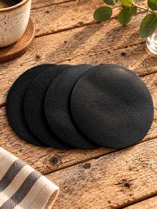 Blank Black Leather Circle Coasters.