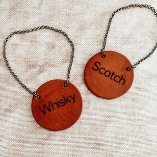 leather bottle tags, personalised with your choice of beverage