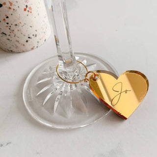Valentines and mothers day special gift ideas. Personalised gold or silver heart wine glass charm personalised with a name.