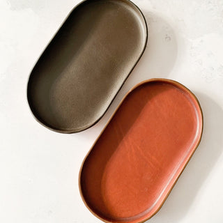 Tan Leather Pill Shape Valet Tray and Catch all Leather tray. Gorgeous entrance way gift or bedside table storage